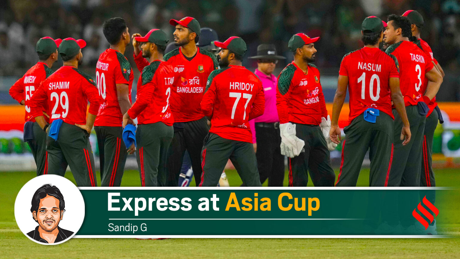 Bangladesh players await the television umpire
